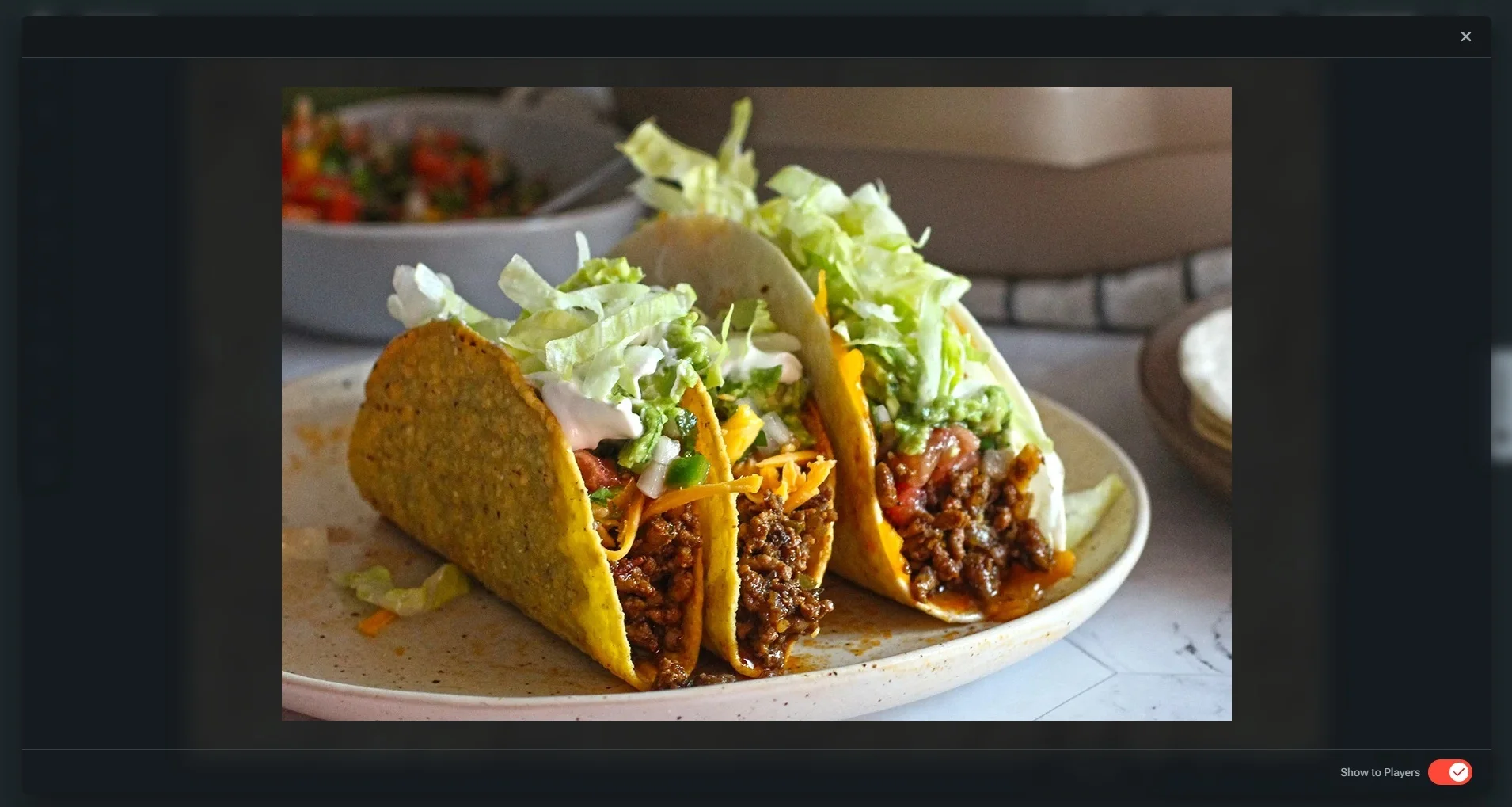 A custom image revealed to the table in Maps VTT