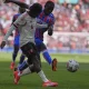 Aksi Jeremie Frimpong mencetak gol di laga Community Shield antara Crystal Palace vs Liverpool di Stadion Wembley, Minggu (10/08/2025). (AP Photo/Dave Shopland).
